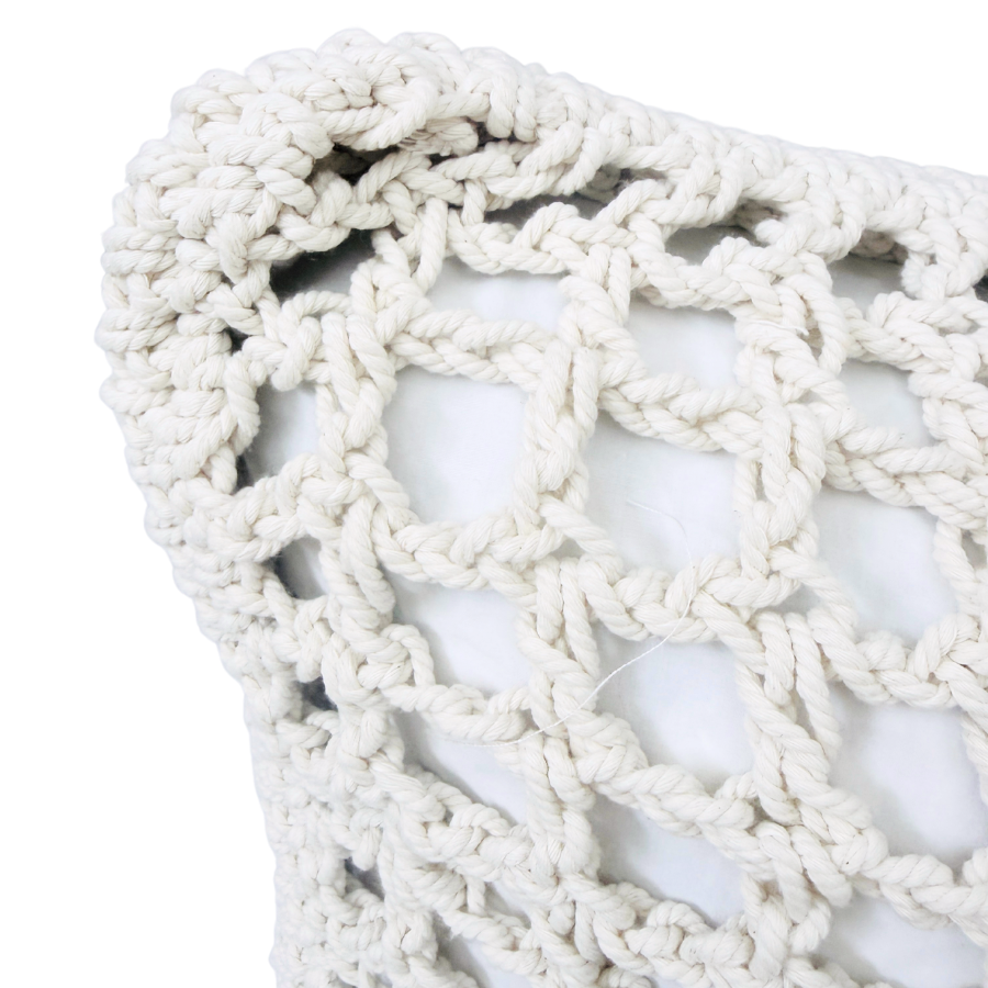 Close-up of a textured white rug with a subtle pattern.