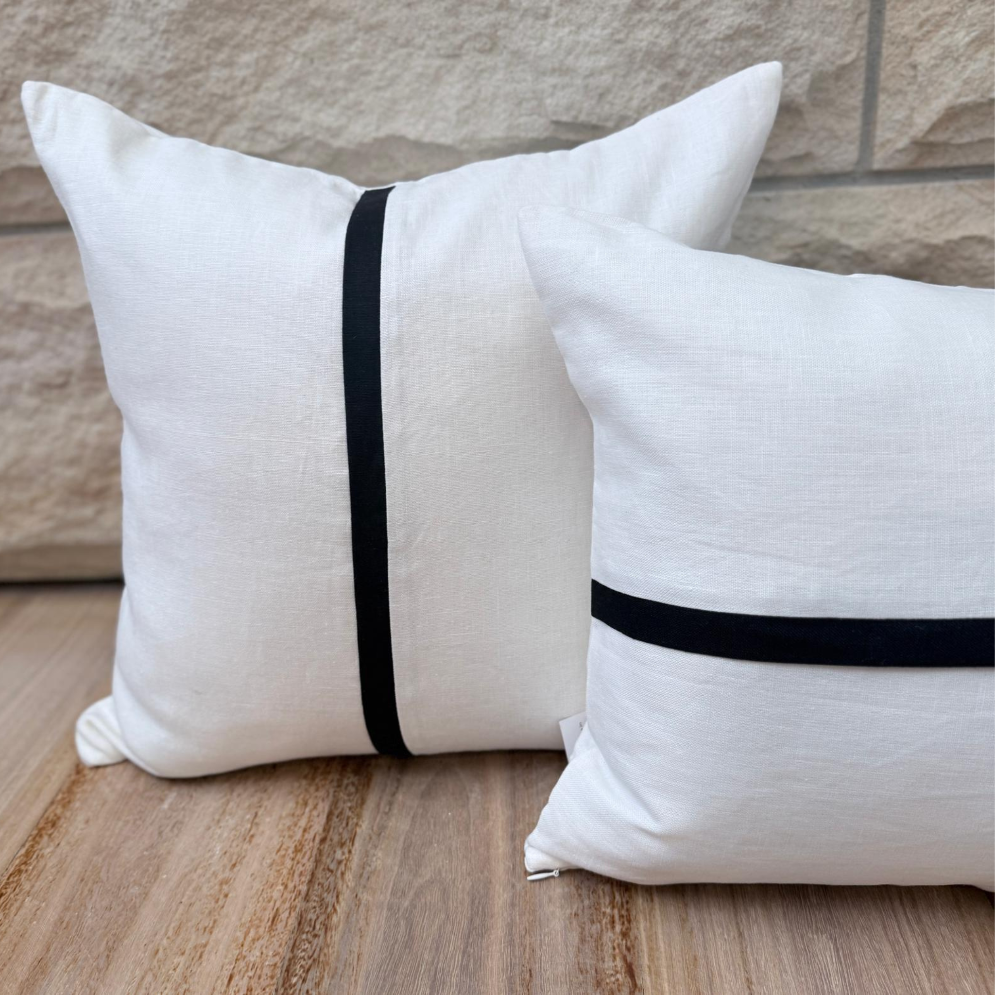 Black and ivory Capri Collection square and oblong cushion set.