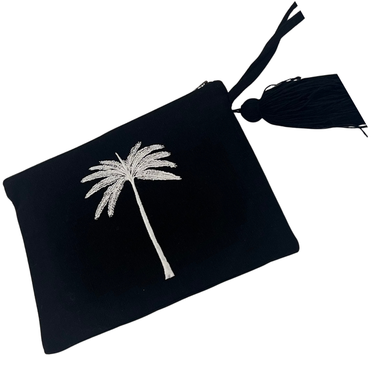 Coastal pouch accessory with black tassel and white embroidered palm