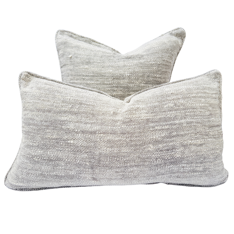 Two gray textured cushion.