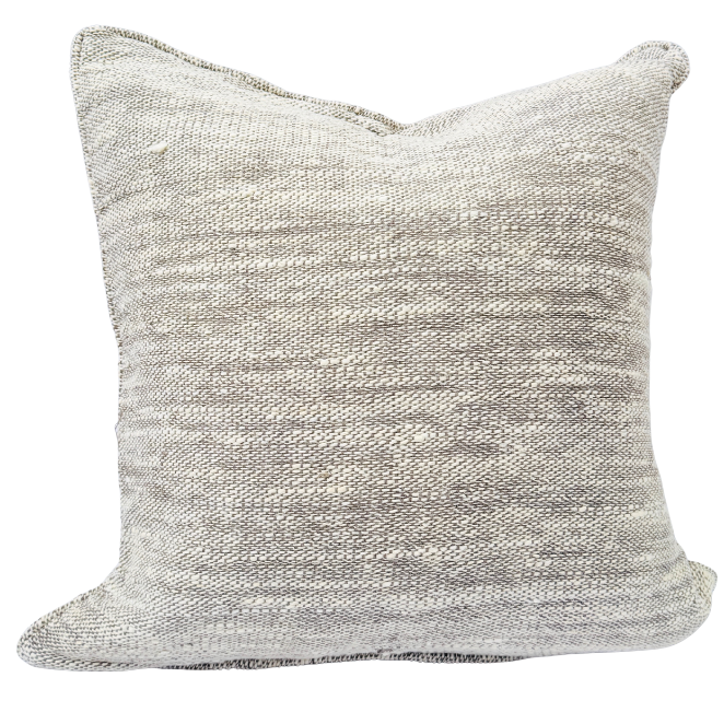 Textured gray cushion.