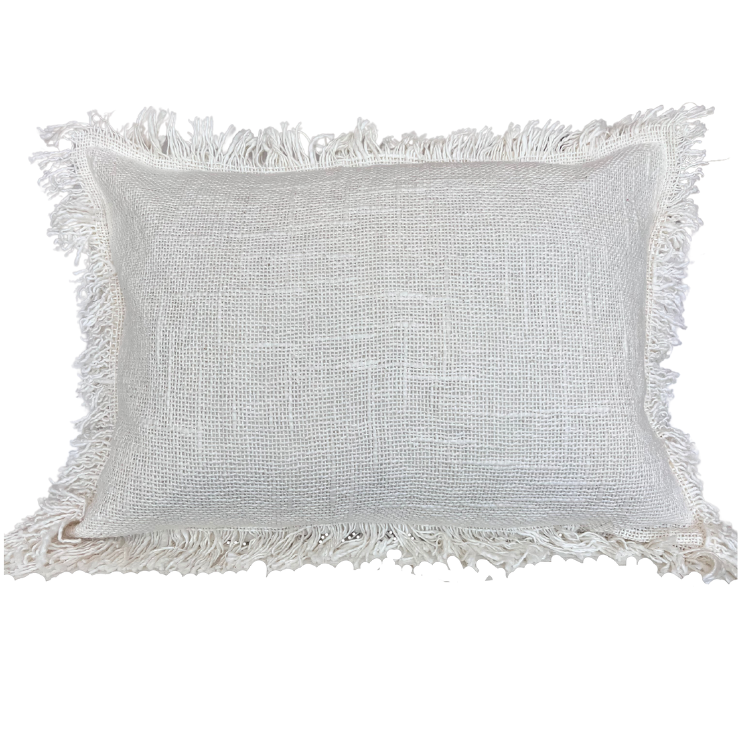A rectangular cream cushion with fringed edges on a white background.