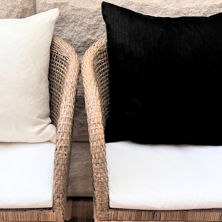 Black and white cushions on a chair. 
