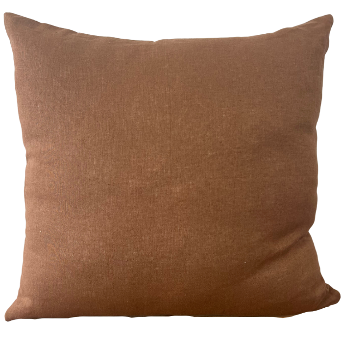 A square-shaped dark brown fine-linen scatter cushion with a visible textured pattern.