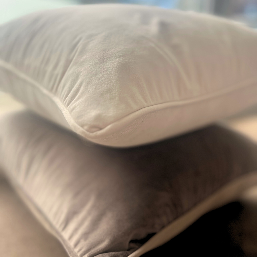 Stacked of cushions.