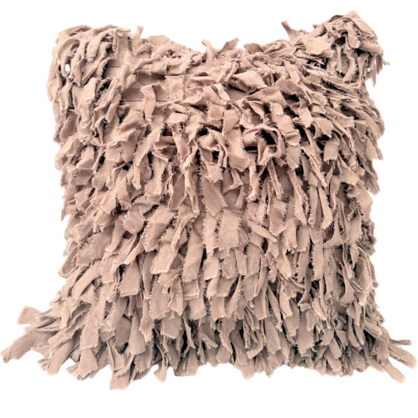 Textured beige cushion.
