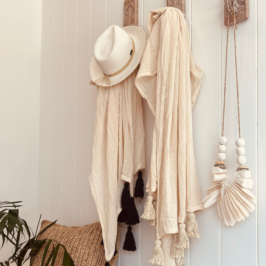 Muslin Throws in black and natural with raffia cushion