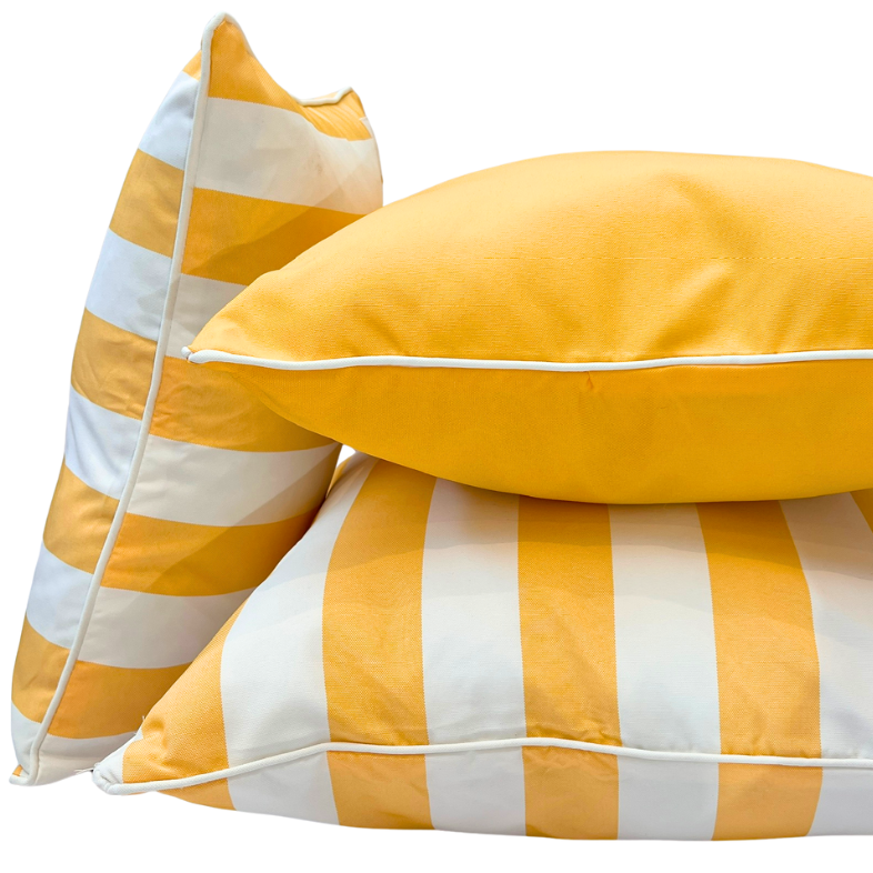 Stacked of yellow cushions. 