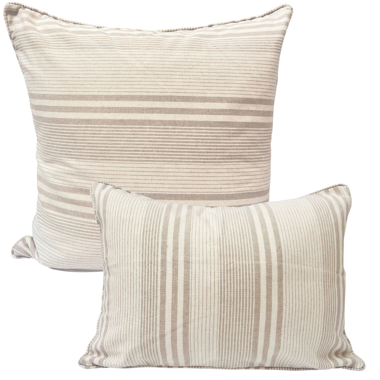 Two cushions with a subtle tan and ivory striped pattern on a white background.