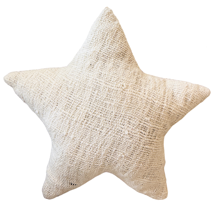 Star-shaped cushion made of textured fabric.