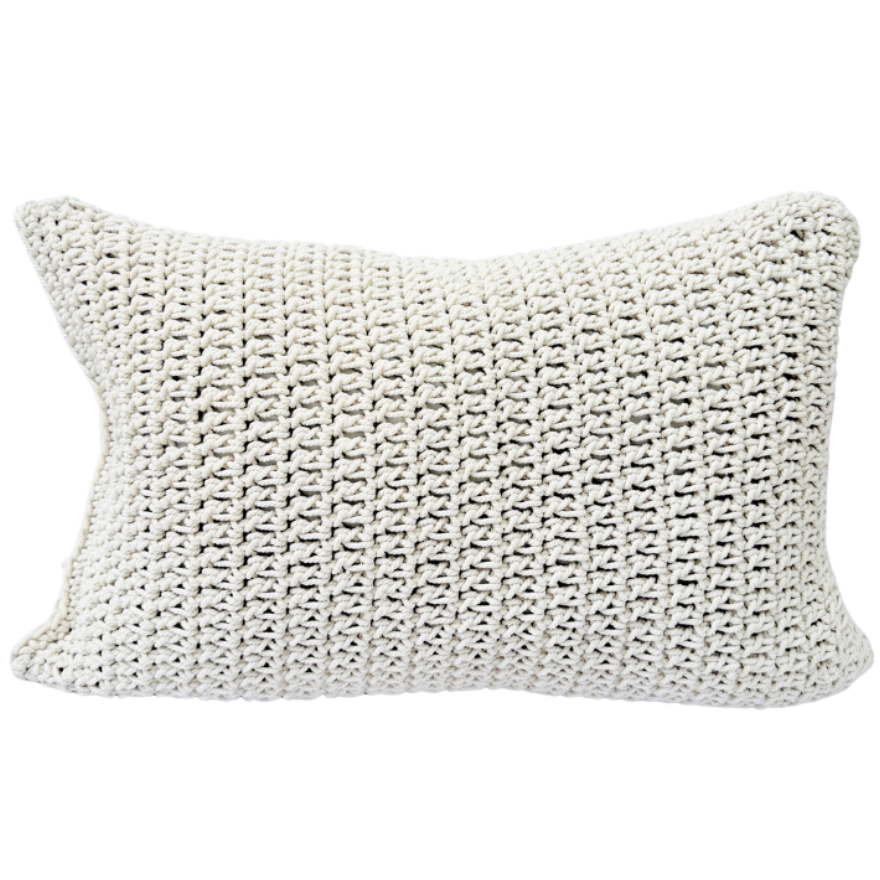 Textured white cushion on a white background