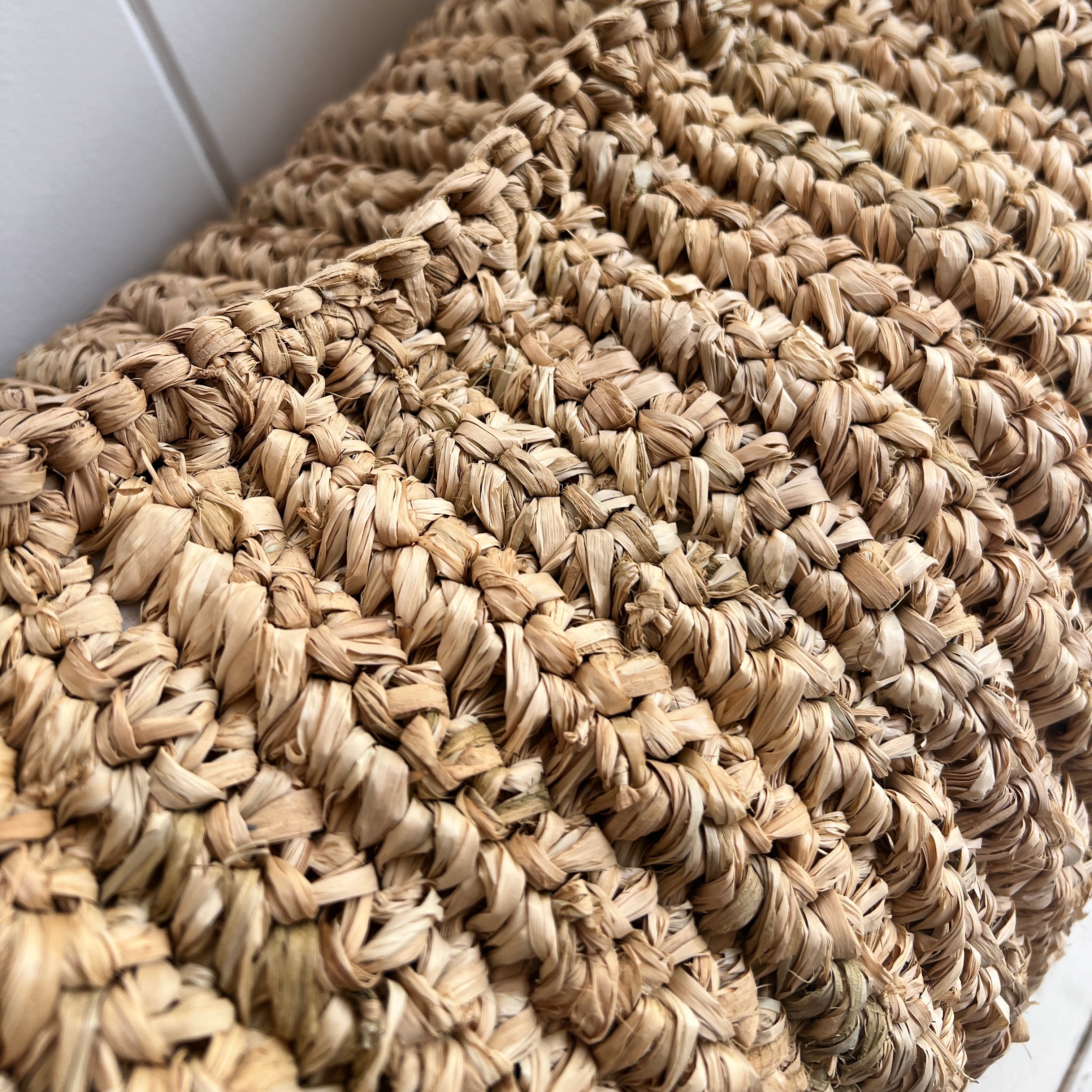 Woven art on fabric.