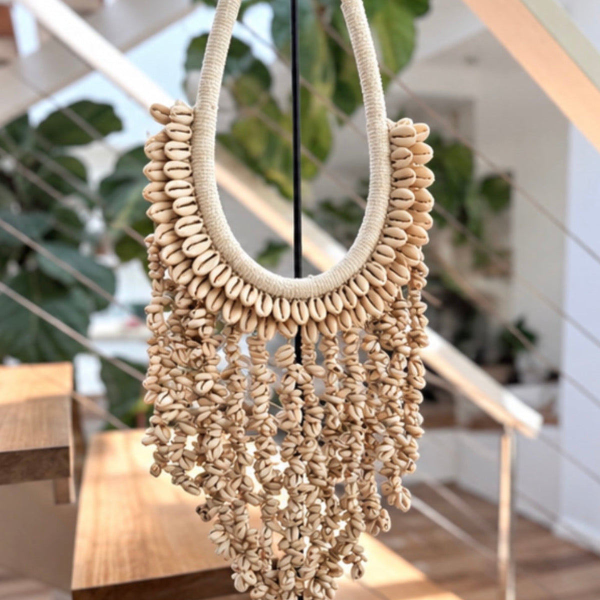 Cowrie shell wall piece