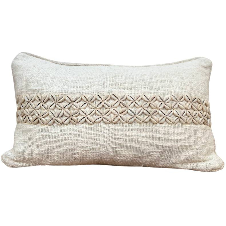Rectangle cushion with shell decor.
